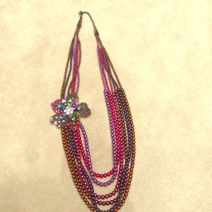 Long broached bead necklace